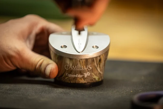 The Camillus Extreme Edge Knife & Shear Sharpener is purpose built to keep your gear in peak working condition wherever you are, because a dull knife is a dangerous knife. A suction cup located on the bottom helps secure the sharpener to flat, clean surfaces and provides safe & easy one-handed sharpening. Featuring a carbide knife sharpener and a ceramic shear sharpener as well, this easily portable sharpener is ideal for home, office, or camp use.
