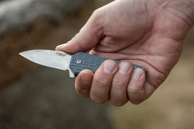 The Camillus WEDGE is a 5.75″ folding knife with a Stainless Steel and G10 handle, featuring a 2.25″ 420 Steel blade and a finger flipper with dual ball bearings for smooth, quick deployment every time.