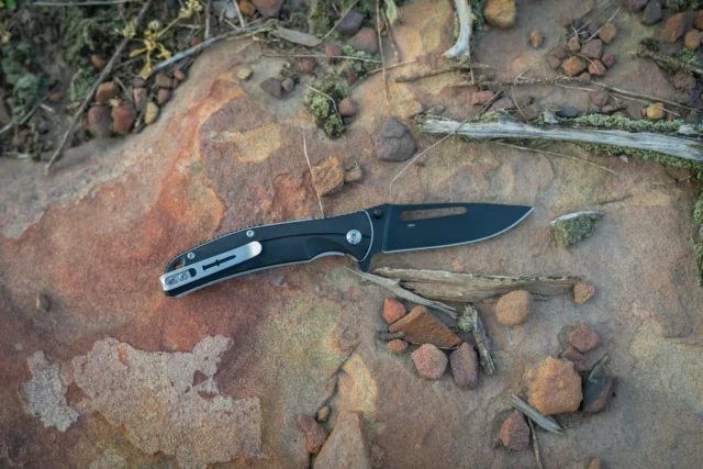 Unleash precision and power with the Camillus Shiloh Pocket Knife, engineered for those who demand reliability in every cut. Crafted with a 3.3” 8Cr13Mov drop point blade, this knife delivers exceptional sharpness and durability, enhanced by a sleek, black-coated finish for corrosion resistance and stealth. At 2.85mm thick, the blade strikes the perfect balance between strength and agility. The Shiloh’s liner lock ensures secure blade deployment, while the ball bearing pivot guarantees smooth, lightning-fast opening every time. Paired with a rugged G10 handle, this knife offers a confident grip in any condition, making it your go-to companion for outdoor adventures, tactical tasks, or everyday carry. Compact yet commanding, the Shiloh measures 7.5” overall, slipping effortlessly into your pocket or pack. Whether you’re slicing through rope, tackling tough materials, or preparing for the unexpected, the Camillus Shiloh is built to perform.